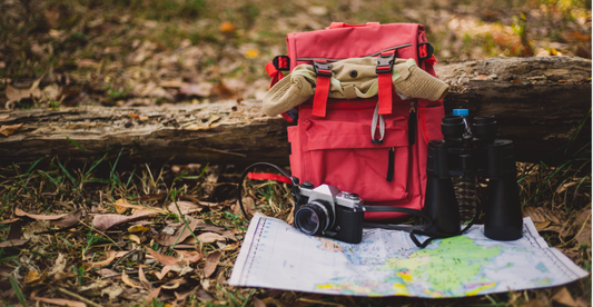 Emergency survival gear including fire blankets, water bottles, and rescue kits